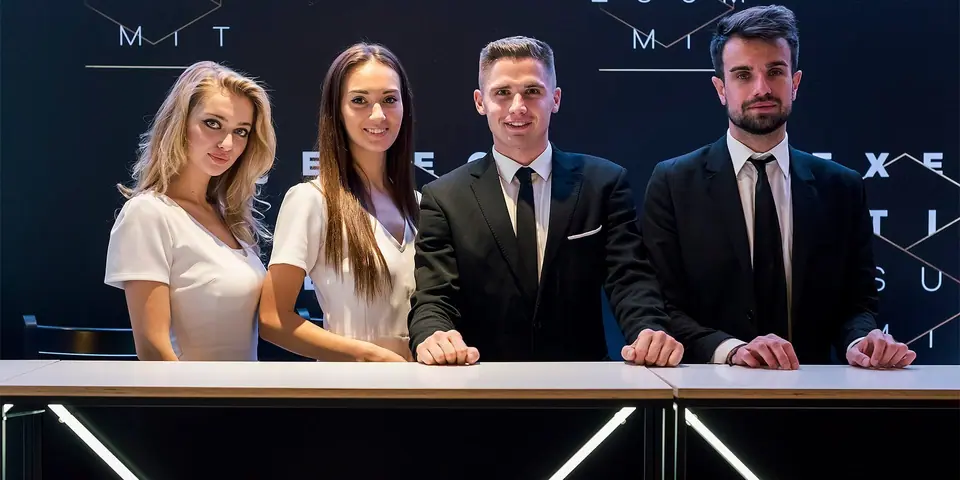 Uśmiechnięty zespół przy rejestracji Executive Summit 2018